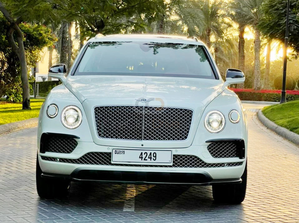 White Bentley Bentayga 2019 for rent in Ajman 1
